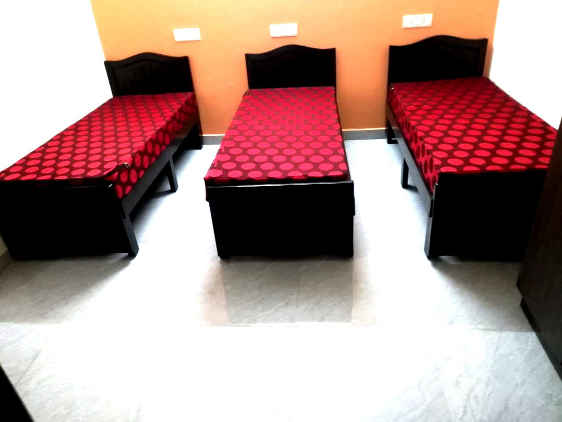 Furnished room with beds