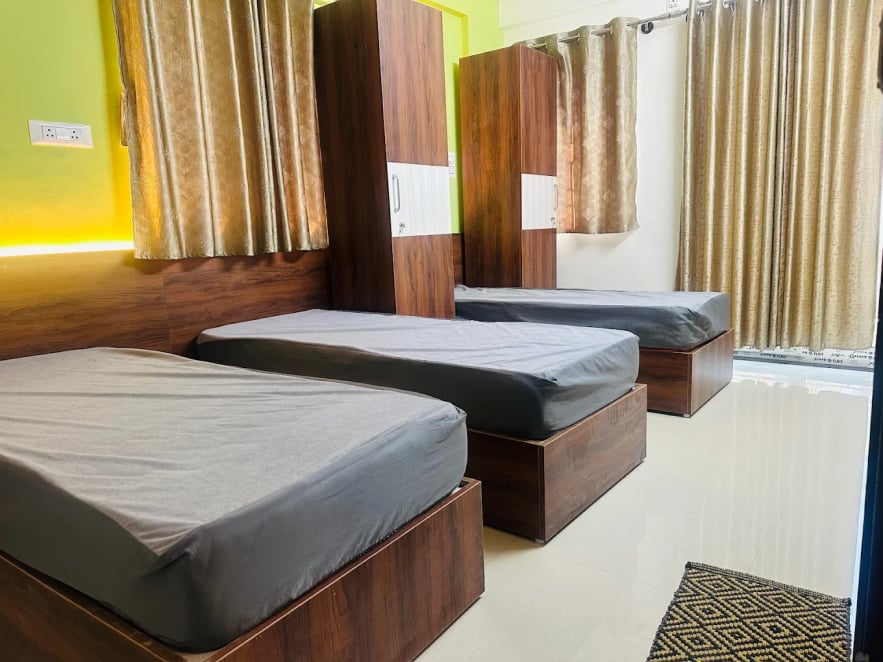 Furnished room with beds and wardrobes